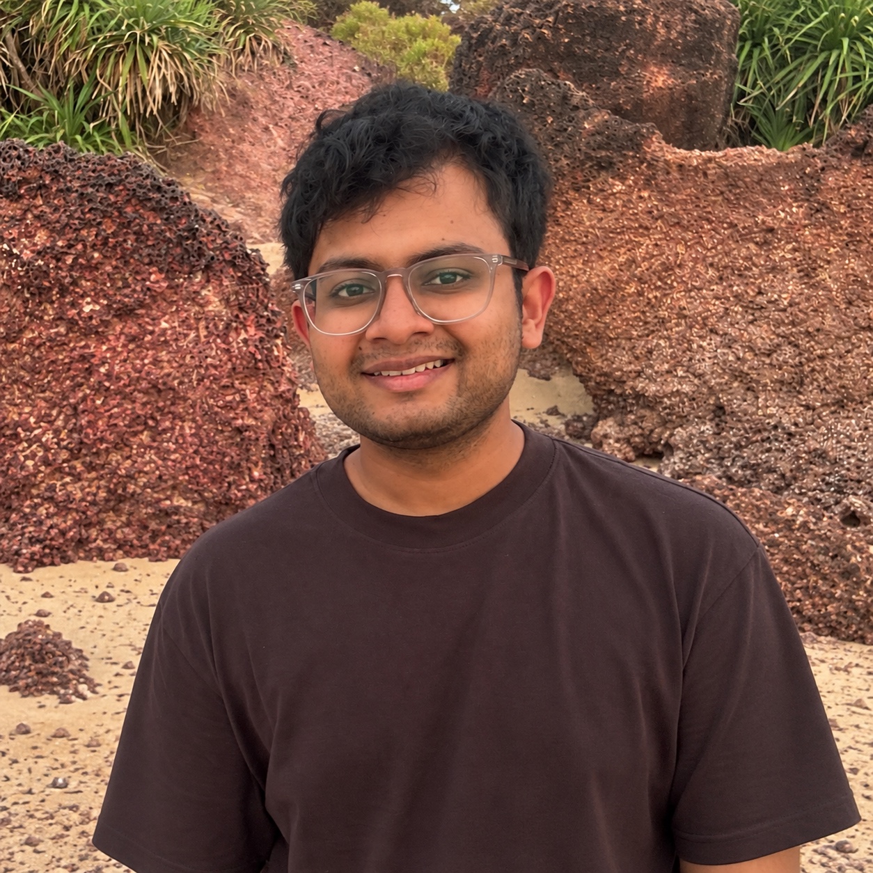 Devansh Gupta at a rocky beach
